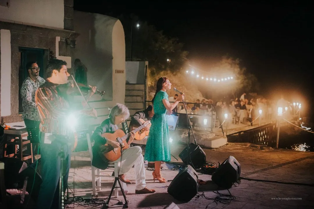 Candlelit seaside wedding dinner in Greece with live swing music by Gadjo Dilo