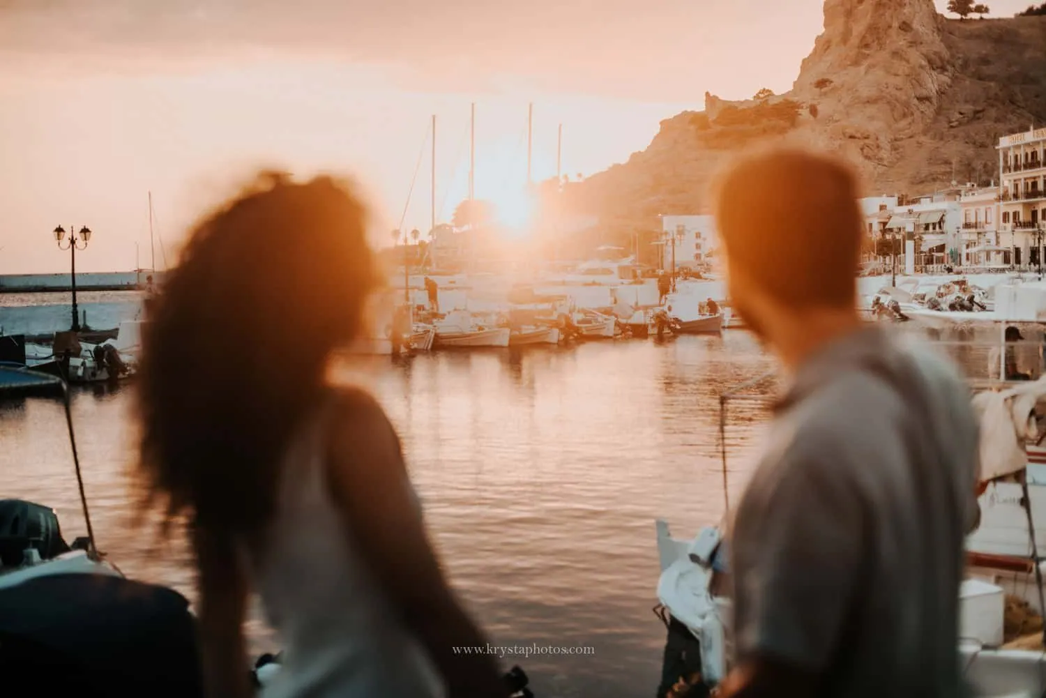 Couple watching the sunset over Myrina, Lemnos